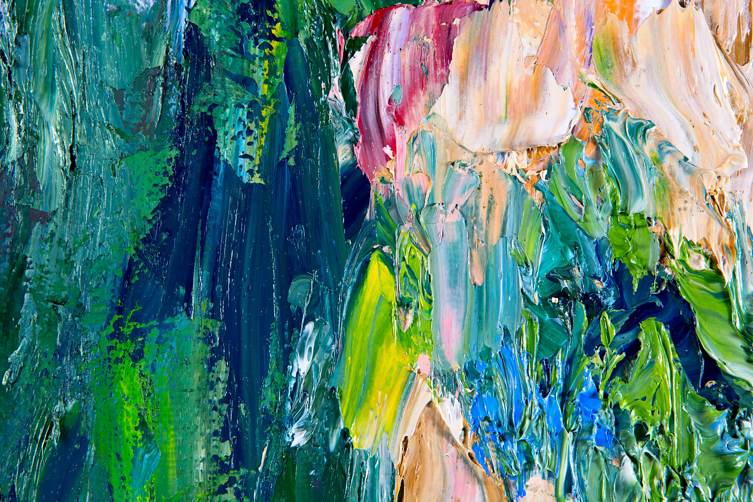 Image is a close up of an oil painting with varying colors of paint smeared on the canvas.
